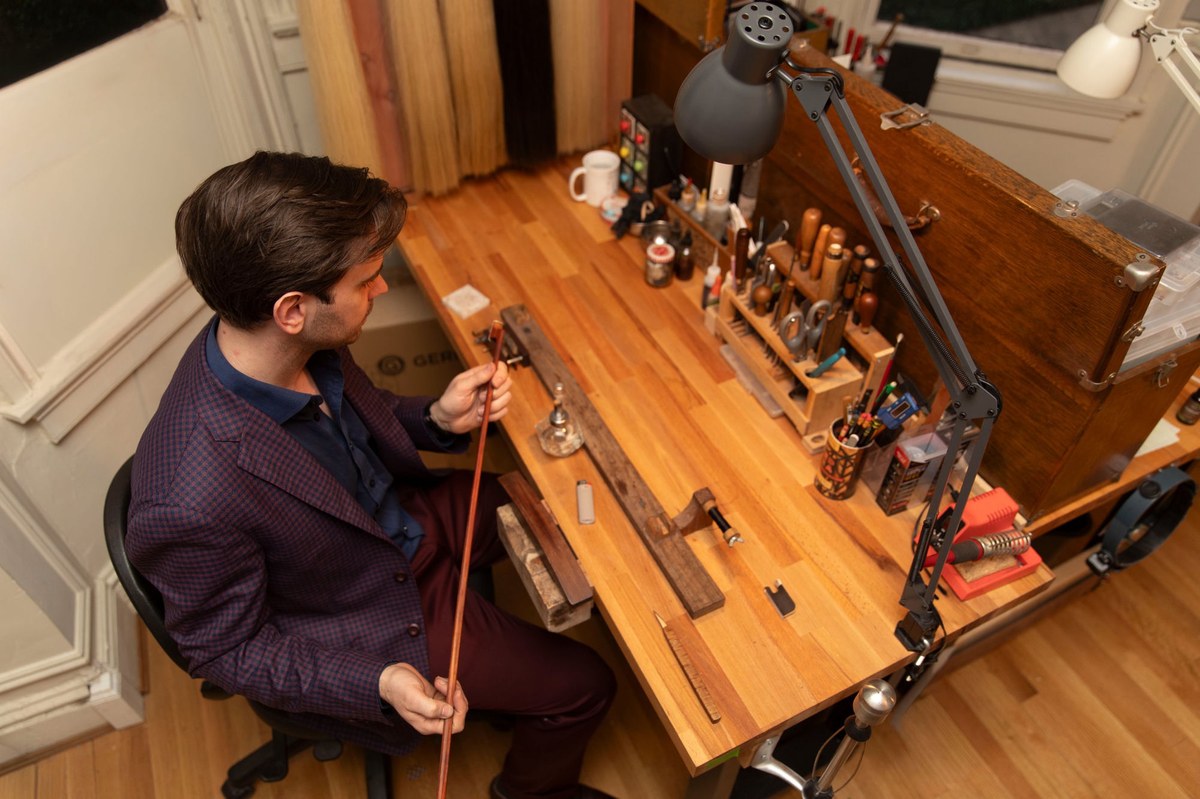Aaron Fini at his bow making workbench